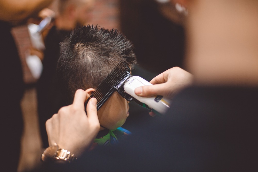 Kid-friendly haircut services in a fun environment